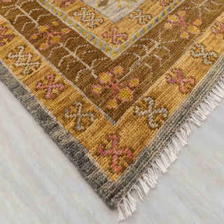 Wool hand-knotted area rug in rust and gold palette, 8x10, soft low pile for living room decor.