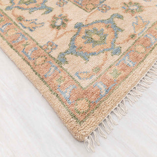 Wool hand-knotted area rug in warm beige and blue, 9x12, soft low pile for living room or dining room.