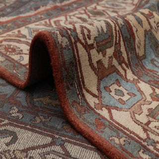 Wool hand-knotted area rug in warm rust and neutral ivory palette, 9x12, durable low pile for living room.