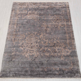 Wool hand-knotted rug in charcoal grey and taupe with distressed damask design, 8x10.