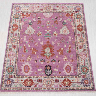 Wool hand-knotted rug in orchid purple, cream, and rust with playful Oushak design, 8x10.