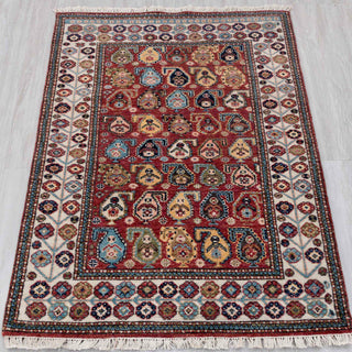 Wool hand-knotted rug in red, ivory, teal, and gold with boteh paisley design, 3x5.

