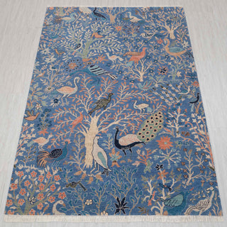 Wool hand-knotted rug in sky blue with birds-and-garden Tree-of-Life design, 6x9 size