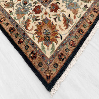 Ziegler-style hand-knotted rug with intricate round floral motifs in navy, beige, blue, 8x10.